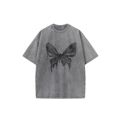 Camiseta lavada con mariposa grunge