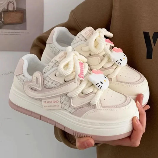 Front view of the beige Hello Kitty Dreamcatcher Sneakers 