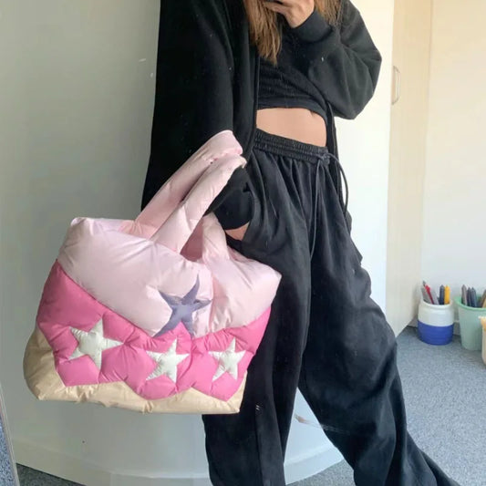Bolso de mano acolchado con estrellas